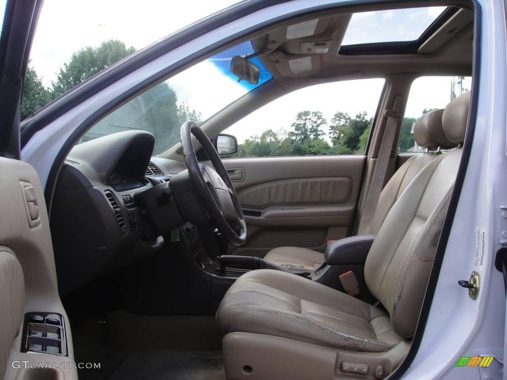 1995 Maxima SE - Arctic White Pearl / Beige photo #10