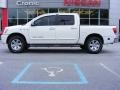 2006 White Nissan Titan LE Crew Cab  photo #1