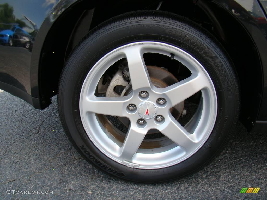2009 G6 V6 Sedan - Carbon Black Metallic / Light Taupe photo #13