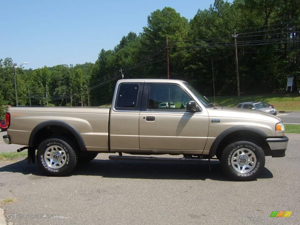 1999 B-Series Truck B3000 SE Extended Cab 4x4 - Harvest Gold Metallic / Tan photo #9