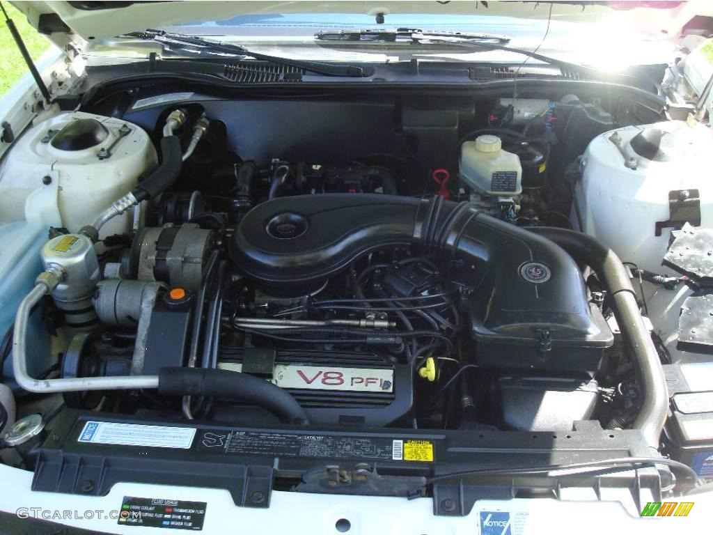 1990 Fleetwood Sedan - White / Blue photo #24