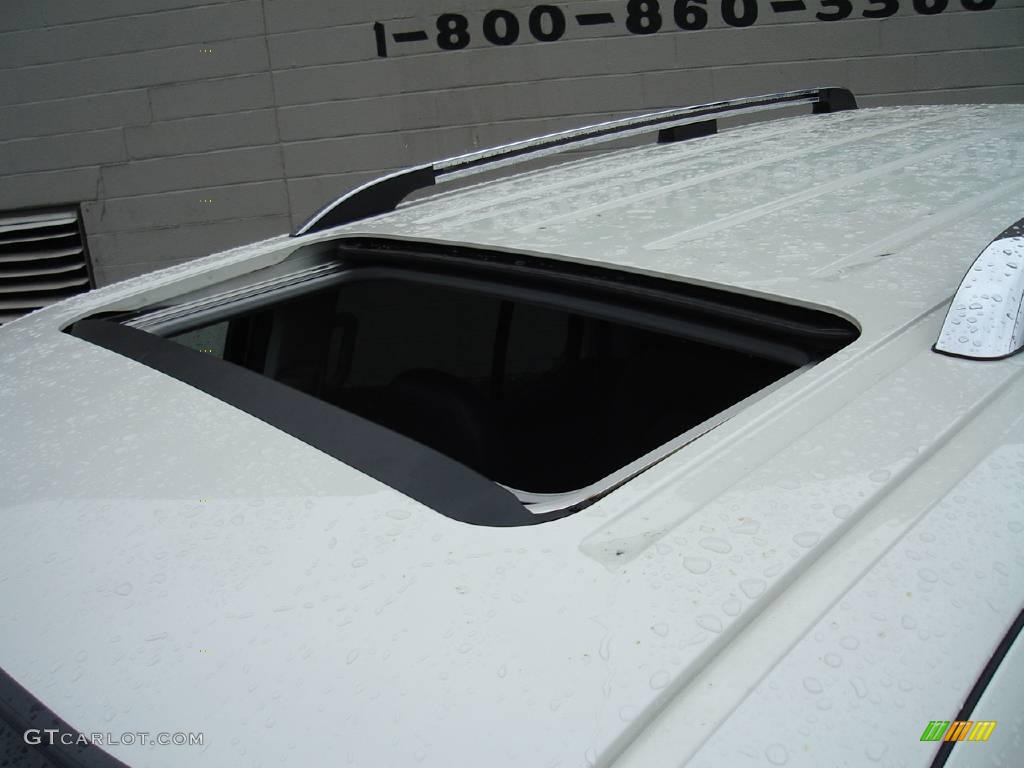 2004 Explorer Limited 4x4 - Ceramic White Tri Coat Metallic / Midnight Grey photo #10