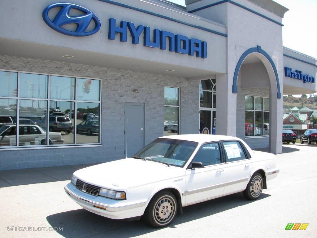 1994 Cutlass Ciera S - Bright White / Adriatic Blue photo #1