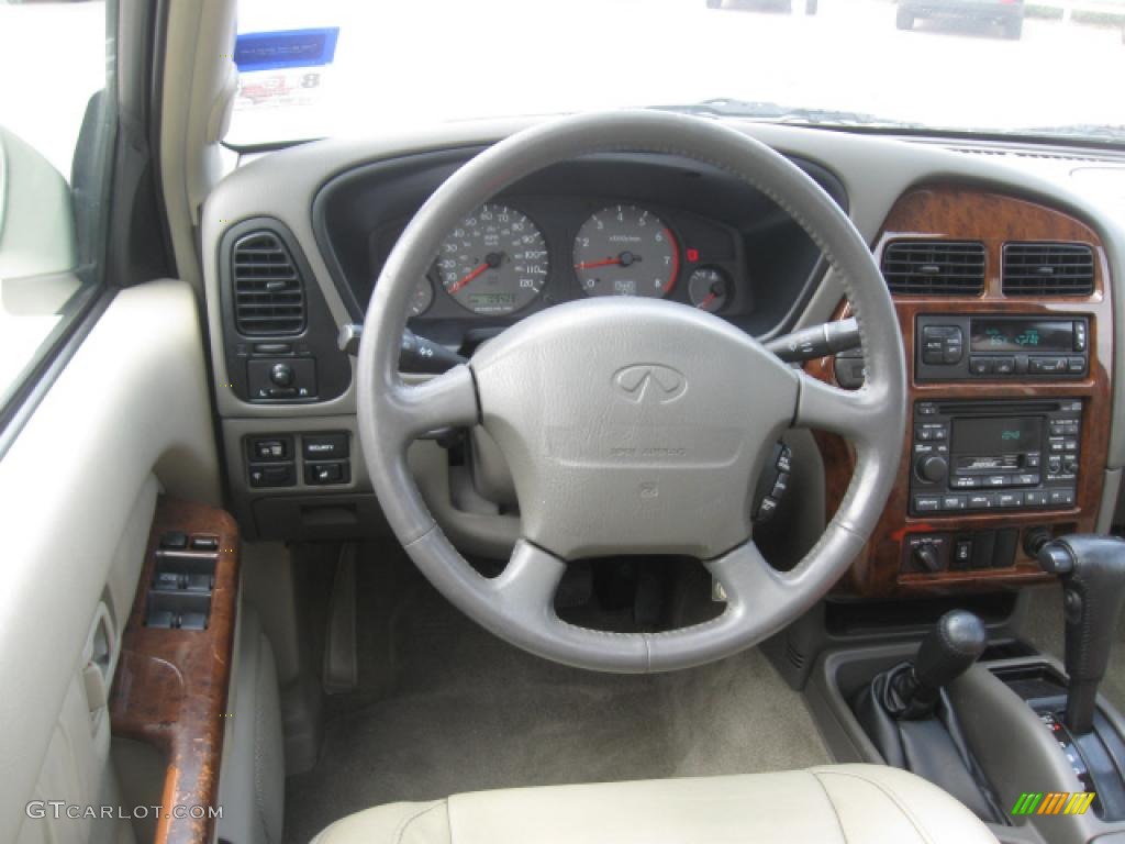 1999 QX4 4x4 - Tuscan Beige Metallic / Beige photo #12