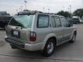 1999 Tuscan Beige Metallic Infiniti QX4 4x4  photo #30