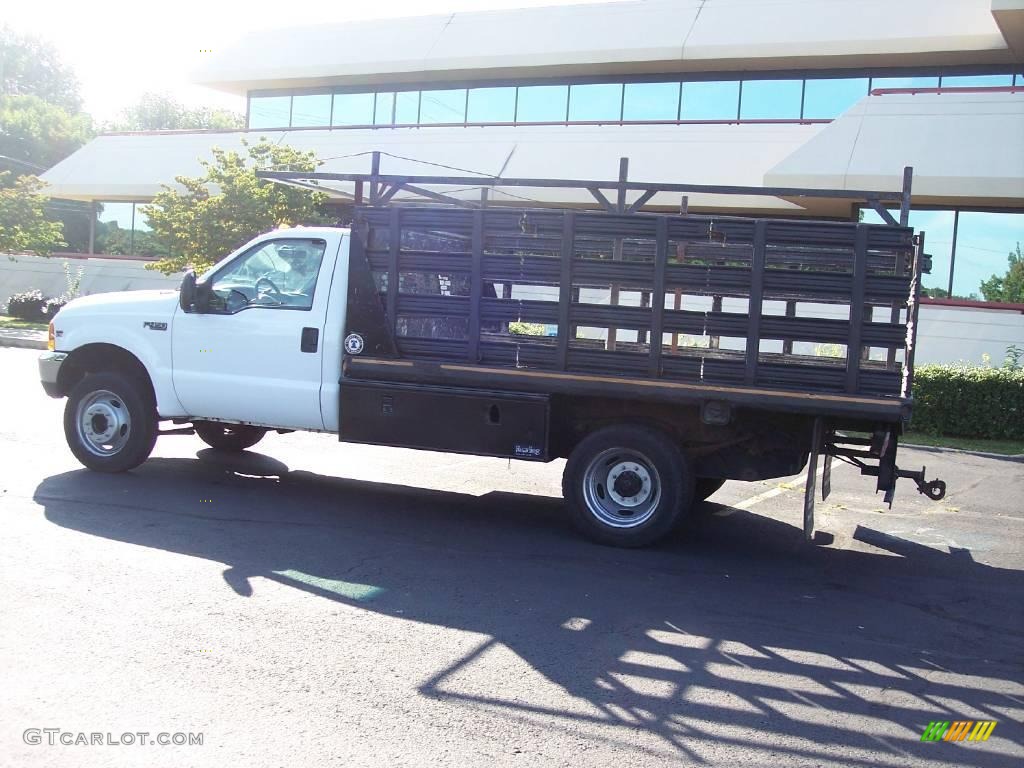 1999 F450 Super Duty XL Regular Cab Dually Chassis Stake Truck - Oxford White / Medium Graphite photo #5