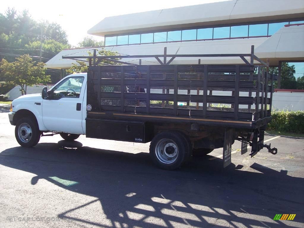 1999 F450 Super Duty XL Regular Cab Dually Chassis Stake Truck - Oxford White / Medium Graphite photo #6