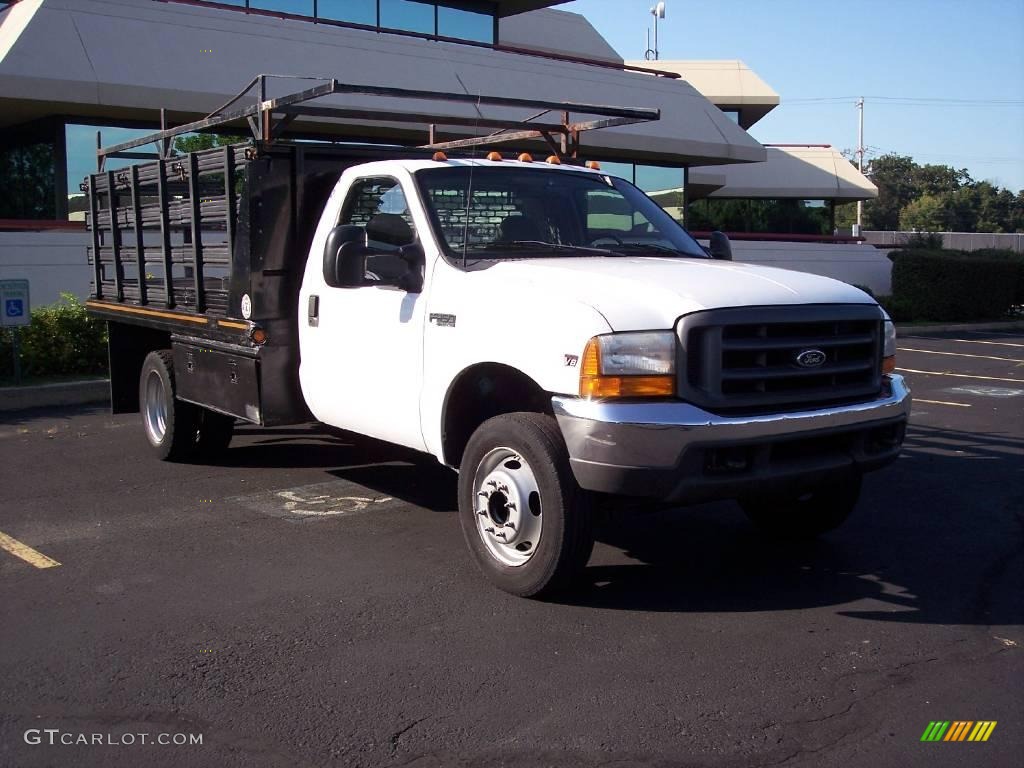 1999 F450 Super Duty XL Regular Cab Dually Chassis Stake Truck - Oxford White / Medium Graphite photo #14