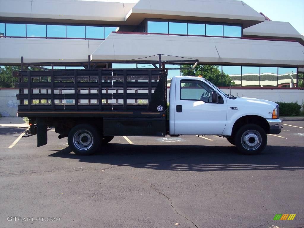 1999 F450 Super Duty XL Regular Cab Dually Chassis Stake Truck - Oxford White / Medium Graphite photo #17