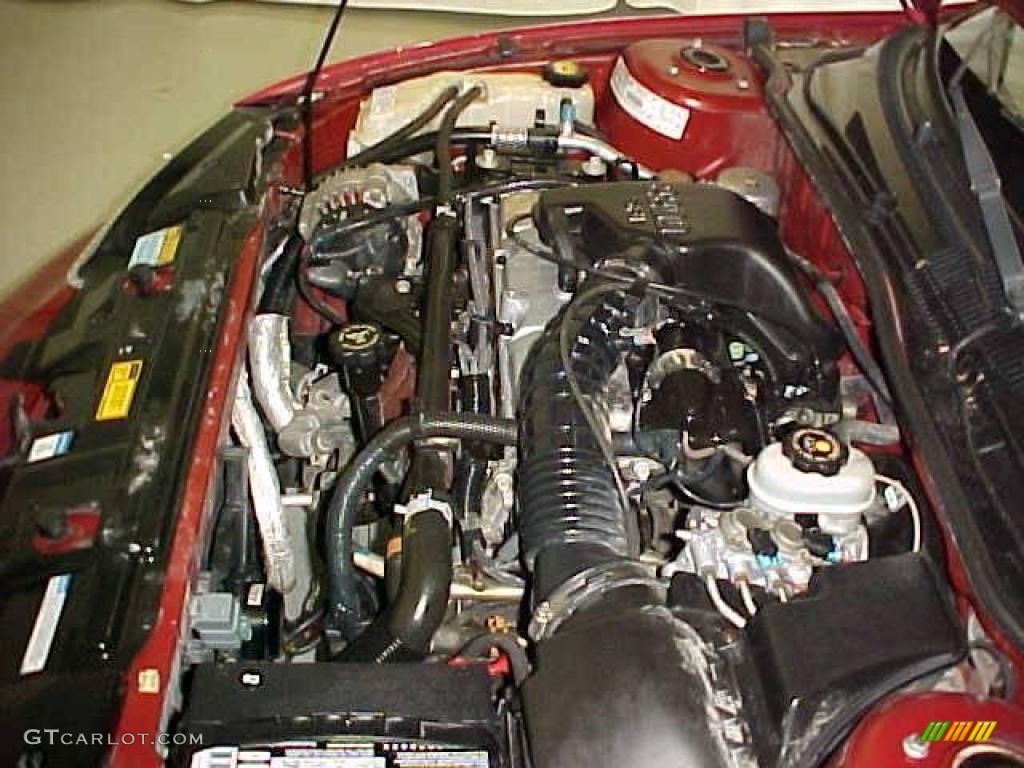 1999 Cavalier Coupe - Cayenne Red Metallic / Graphite photo #16
