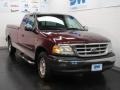 1999 Dark Toreador Red Metallic Ford F150 XLT Extended Cab  photo #1
