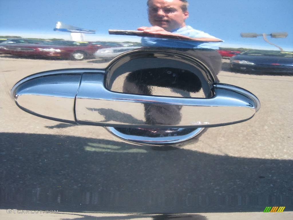 2004 Escape Limited - Black / Ebony Black photo #15