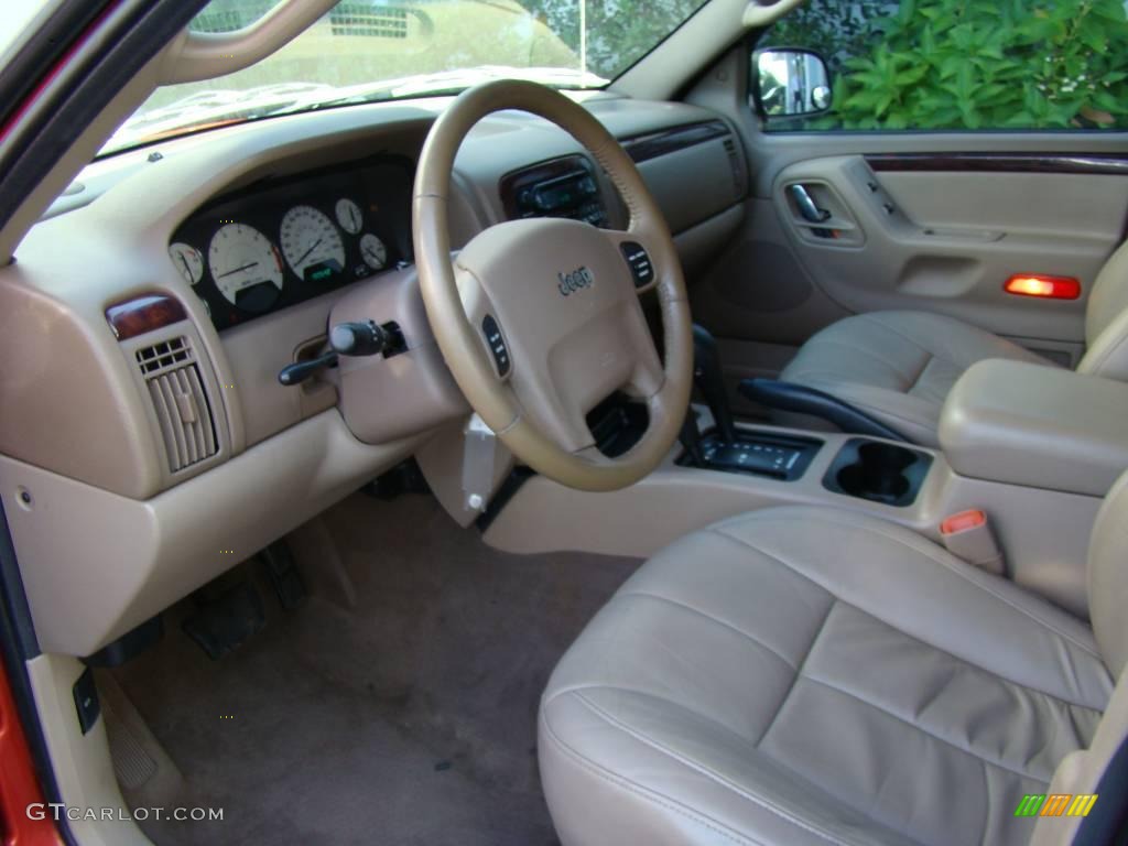 2002 Grand Cherokee Limited 4x4 - Inferno Red Tinted Pearlcoat / Sandstone photo #10