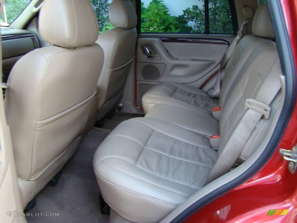 2002 Grand Cherokee Limited 4x4 - Inferno Red Tinted Pearlcoat / Sandstone photo #12