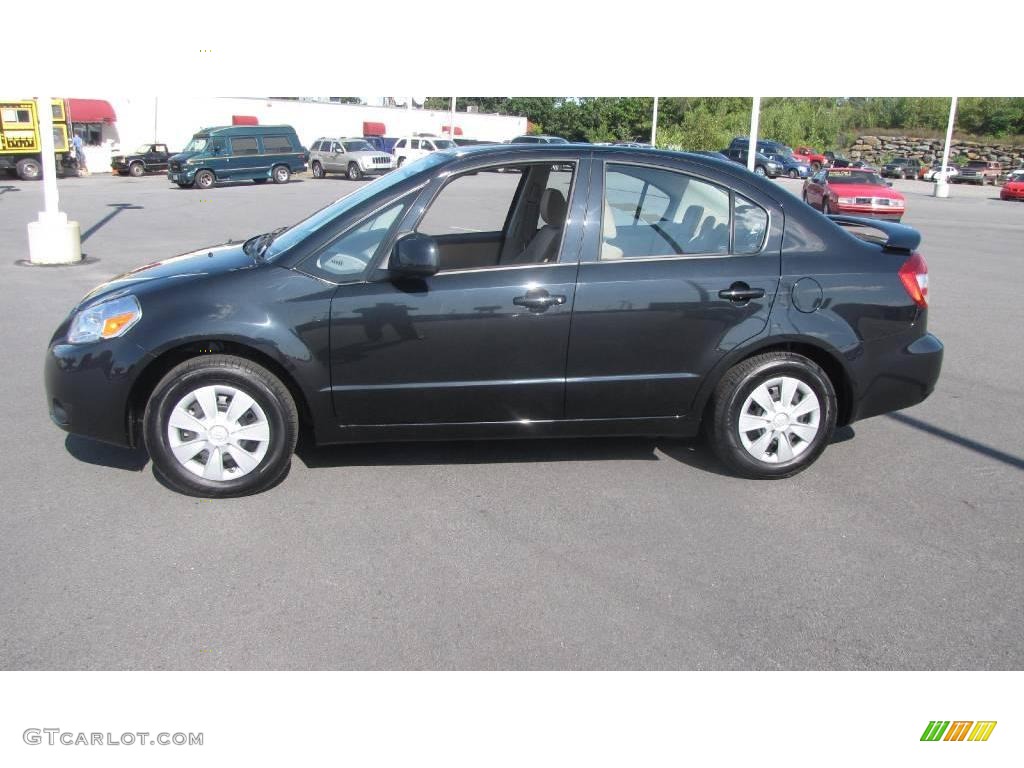 2009 SX4 Sedan - Black Pearl Metallic / Beige photo #1