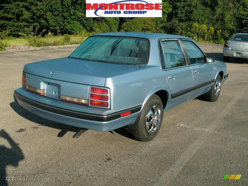 1991 Cutlass Ciera SL Sedan - Light Sapphire Blue Metallic / Blue photo #3