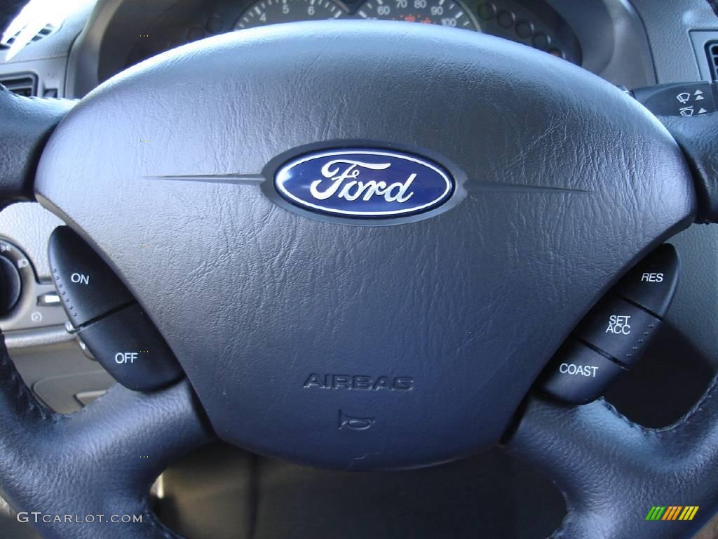2005 Focus ZX4 SE Sedan - Sonic Blue Metallic / Dark Flint/Light Flint photo #24