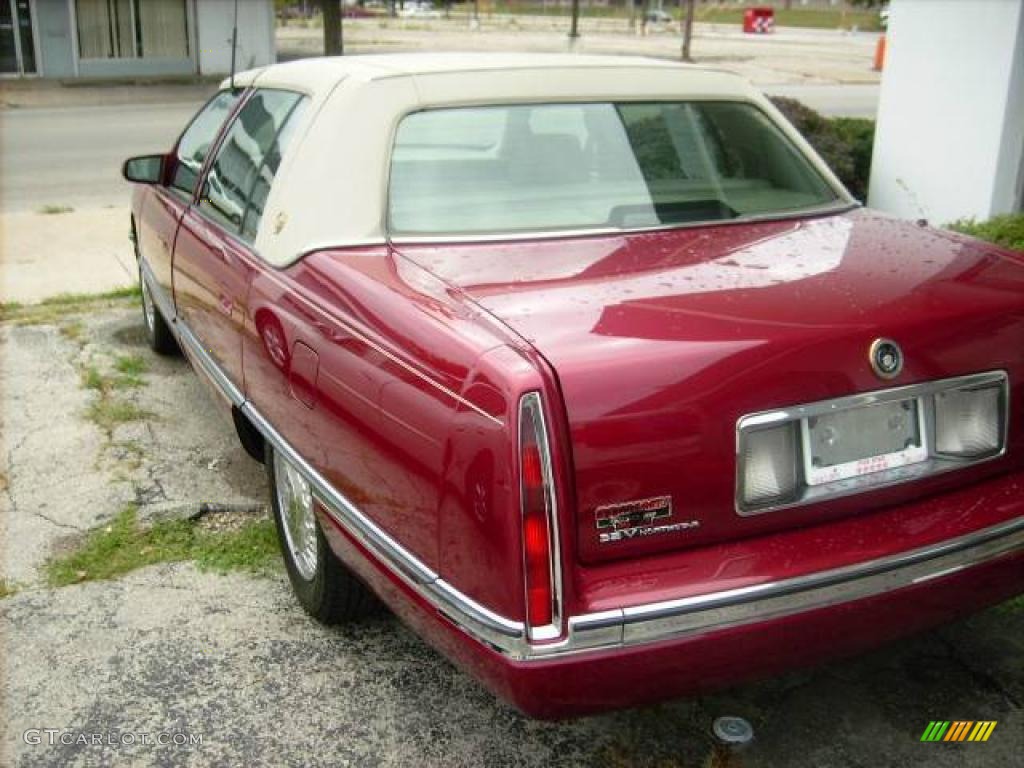 Red Tintcoat Cadillac DeVille