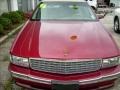 1996 Red Tintcoat Cadillac DeVille Sedan  photo #5