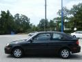 2004 Ebony Black Hyundai Accent Coupe  photo #2