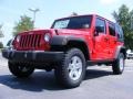 2009 Flame Red Jeep Wrangler Unlimited Rubicon 4x4  photo #1