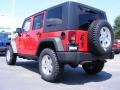 2009 Flame Red Jeep Wrangler Unlimited Rubicon 4x4  photo #2