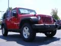 2009 Flame Red Jeep Wrangler Unlimited Rubicon 4x4  photo #4