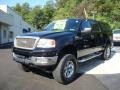 2004 Black Ford F150 Lariat SuperCrew 4x4  photo #33