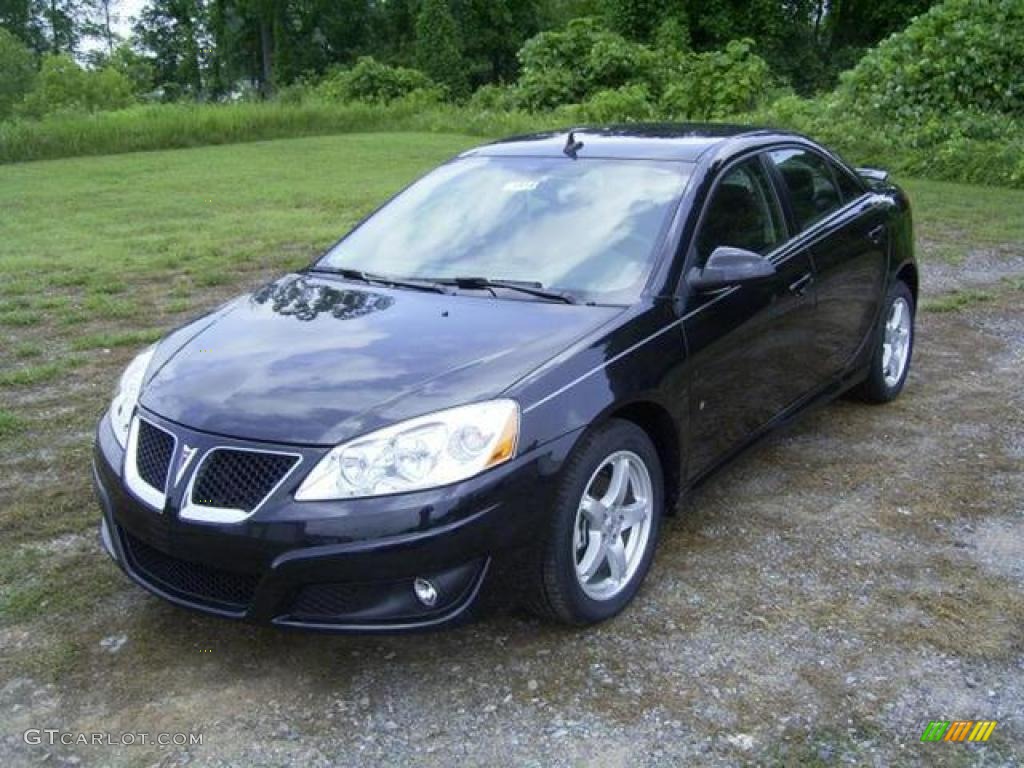 2009 G6 V6 Sedan - Carbon Black Metallic / Ebony photo #1