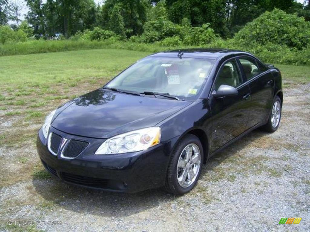 2009 G6 GT Sedan - Carbon Black Metallic / Light Taupe photo #1