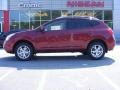 2009 Venom Red Nissan Rogue SL  photo #1