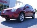 2009 Venom Red Nissan Rogue SL  photo #2