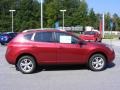 2009 Venom Red Nissan Rogue SL  photo #5