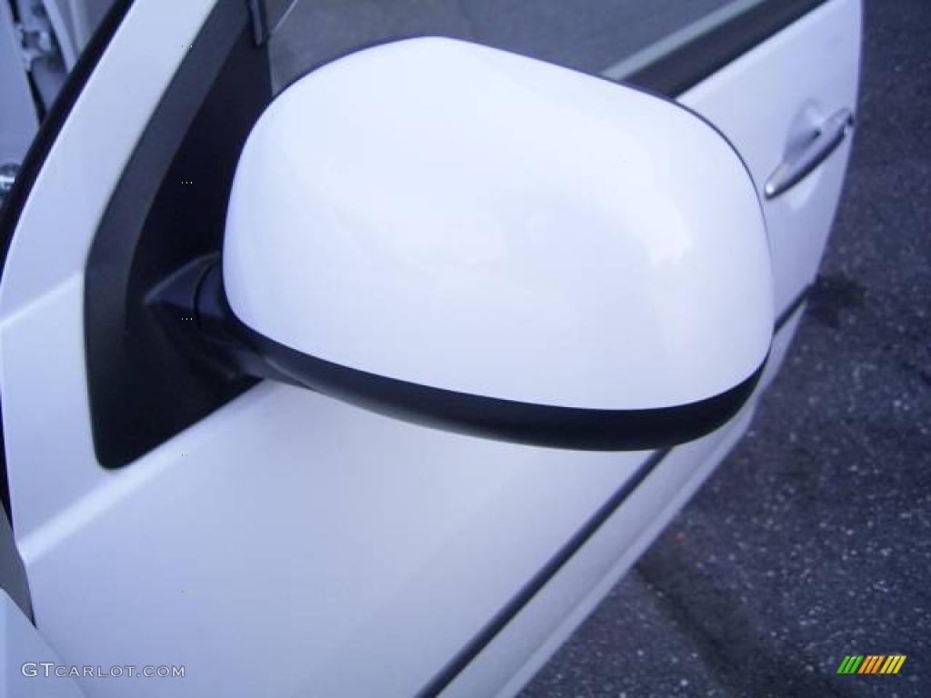 2009 Outlander XLS 4WD - Diamond White Pearl / Beige photo #30