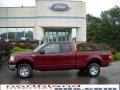 2005 Dark Toreador Red Metallic Ford F150 XLT SuperCab 4x4  photo #1