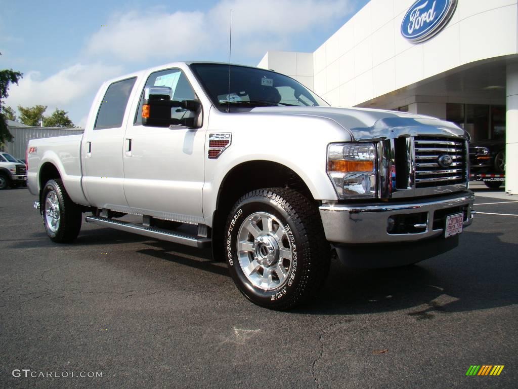 2010 F250 Super Duty Lariat Crew Cab 4x4 - Ingot Silver Metallic / Camel photo #1