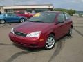 2005 Sangria Red Metallic Ford Focus ZX3 SE Coupe  photo #1