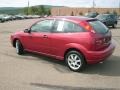 2005 Sangria Red Metallic Ford Focus ZX3 SE Coupe  photo #18