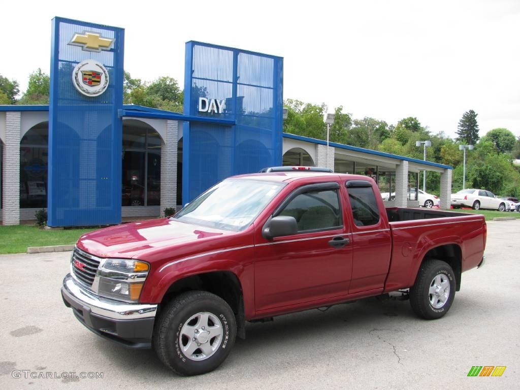 2005 Canyon SL Extended Cab 4x4 - Cherry Red Metallic / Pewter photo #1