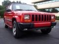 1999 Flame Red Jeep Cherokee Sport 4x4  photo #23