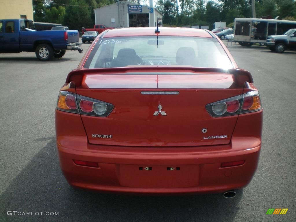 2010 Lancer GTS - Rotor Glow Orange Metallic / Black photo #9