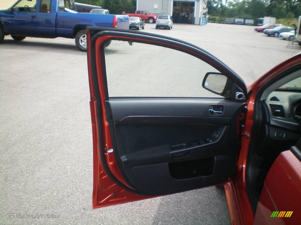 2010 Lancer GTS - Rotor Glow Orange Metallic / Black photo #16