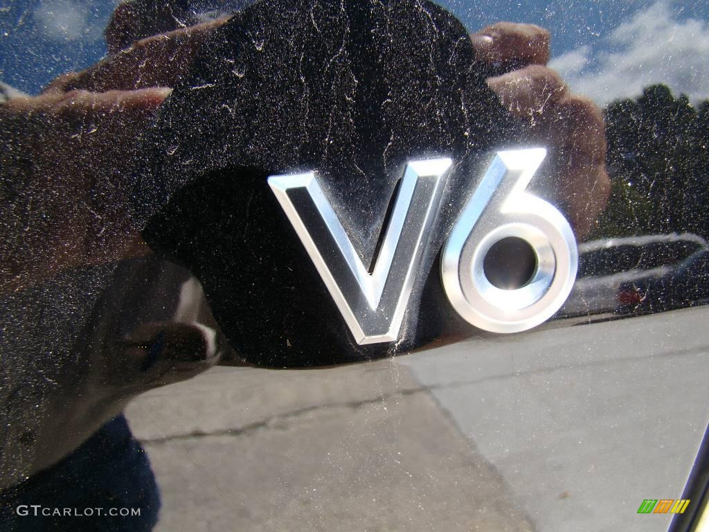 2005 Mariner V6 Convenience - Black / Pebble/Light Parchment photo #27
