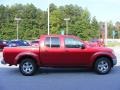 2009 Red Brick Nissan Frontier SE Crew Cab  photo #5