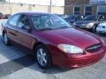 2002 Matador Red Metallic Ford Taurus SE  photo #3