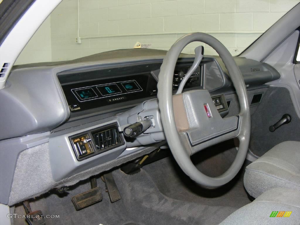 1990 Cutlass Supreme Sedan - Medium Garnet Red Metallic / Gray photo #12