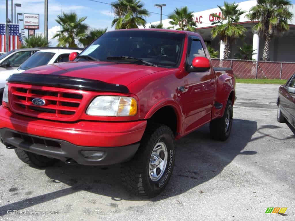 2003 F150 XL Regular Cab 4x4 - Bright Red / Dark Graphite Grey photo #1