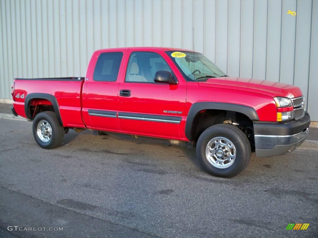 2005 Silverado 2500HD LS Extended Cab 4x4 - Victory Red / Tan photo #1
