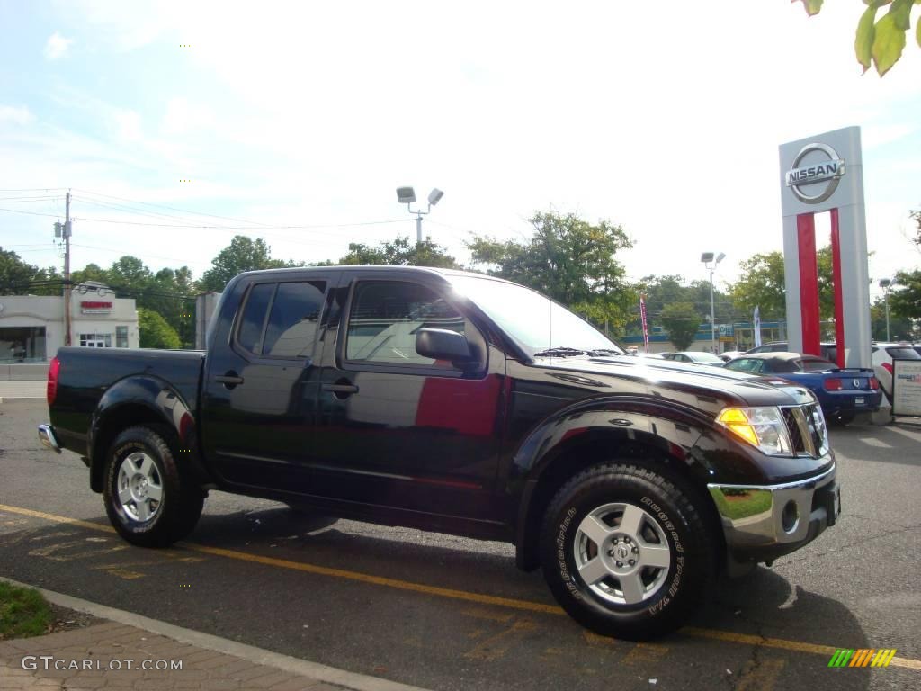 2006 Frontier SE Crew Cab 4x4 - Super Black / Steel photo #13