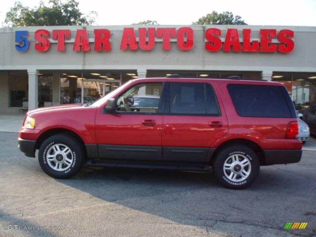 2003 Expedition XLT 4x4 - Laser Red Tinted Metallic / Medium Parchment photo #1